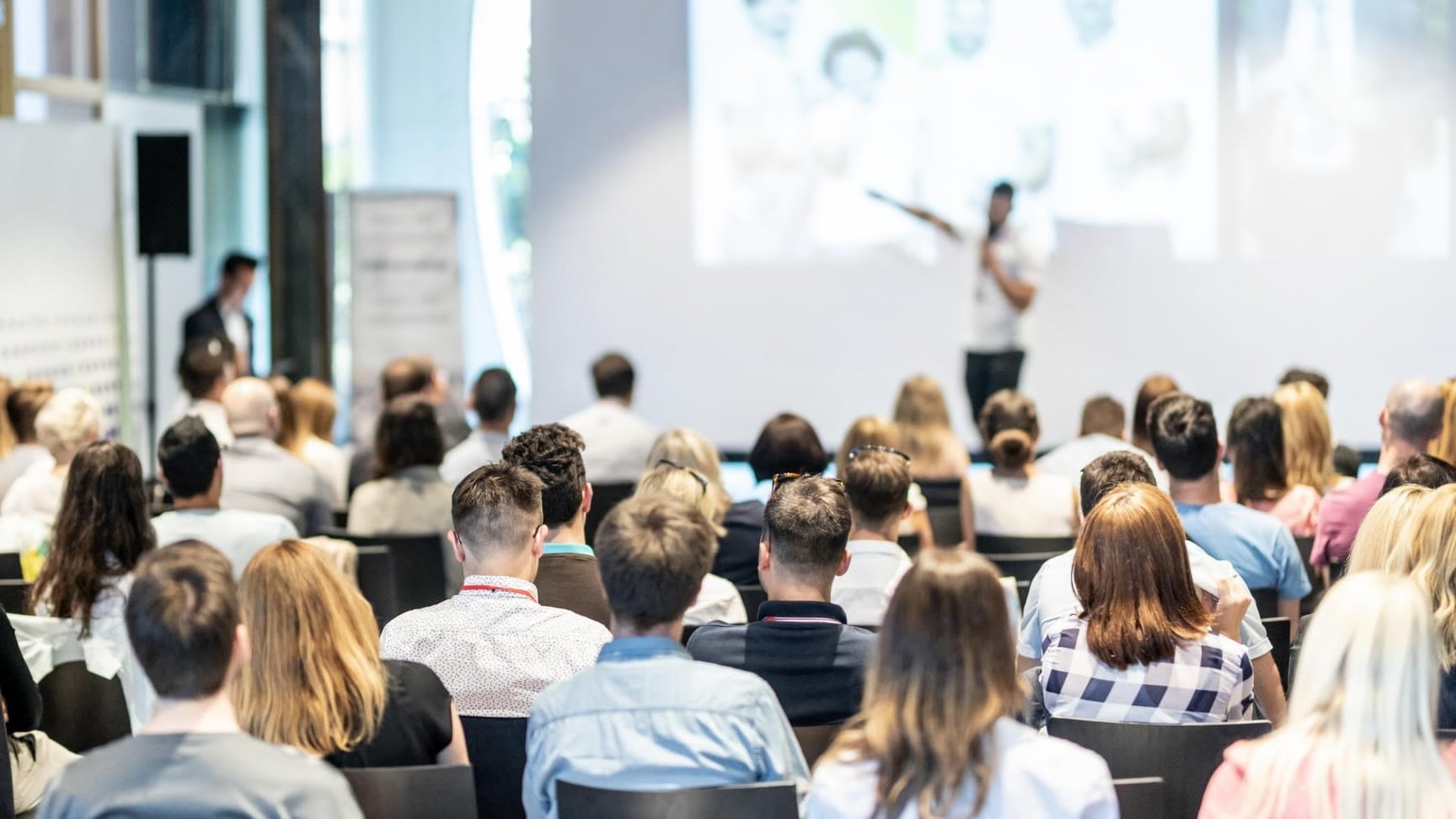 Speaker presenting at a medical conference